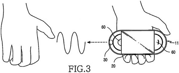 Un'immagine dalla documentazione depositata da Samsung per il brevetto relativo al "lettore multimediale con air guitar" Un'immagine dalla documentazione depositata da Samsung per il brevetto relativo al "lettore multimediale con air guitar"