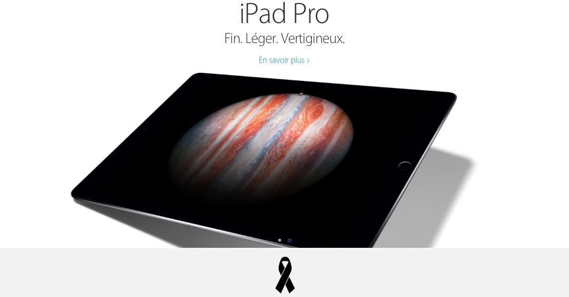 Attentati Parigi, un fiocco nero sull'Apple Store francese